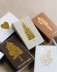 Noble Fir Tree | Cream + Gold Matchbook